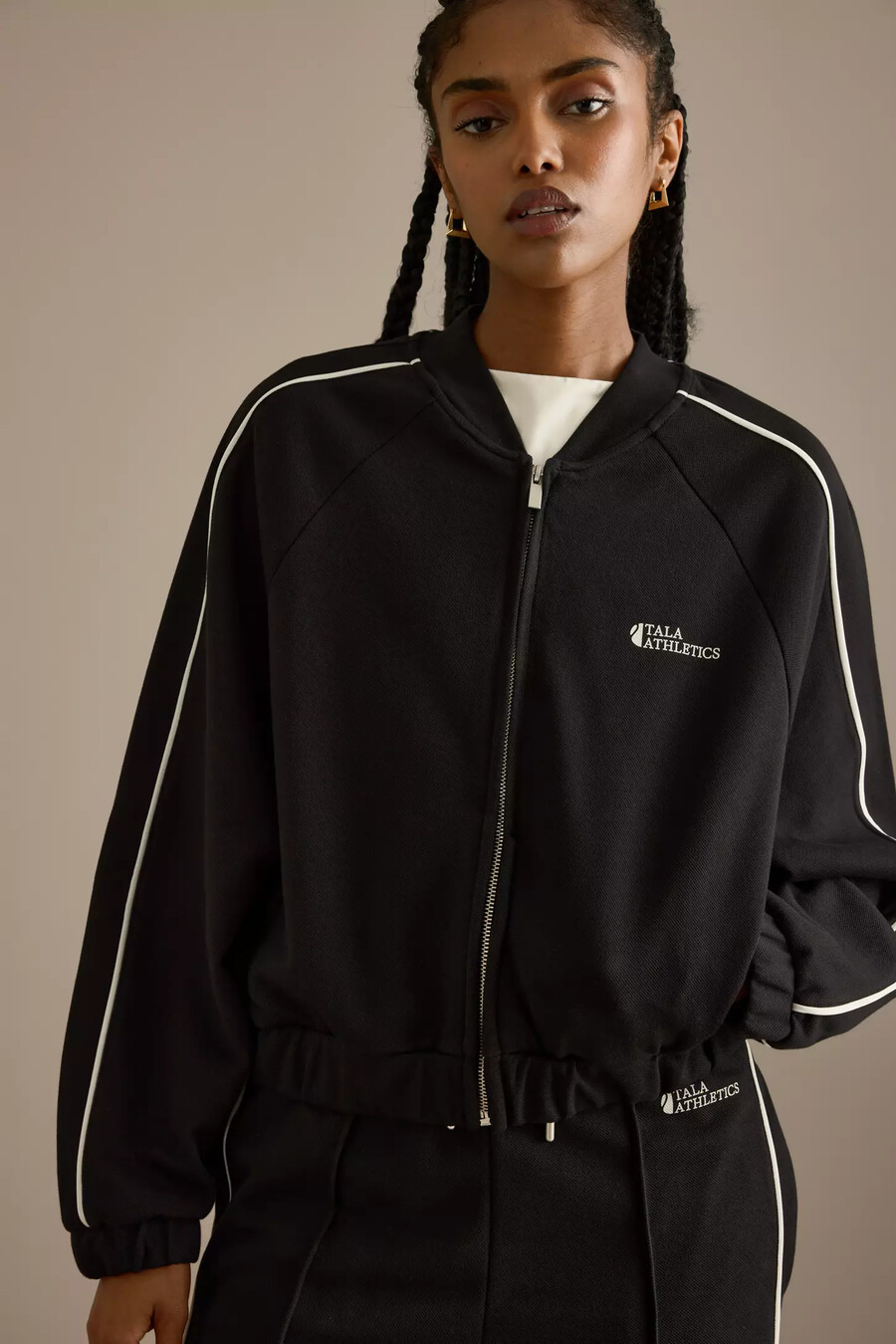 tala trainingsjacke mit kontrastpaspelierung
