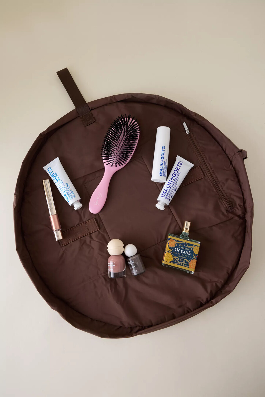 the flat lay co. open flat makeup bag