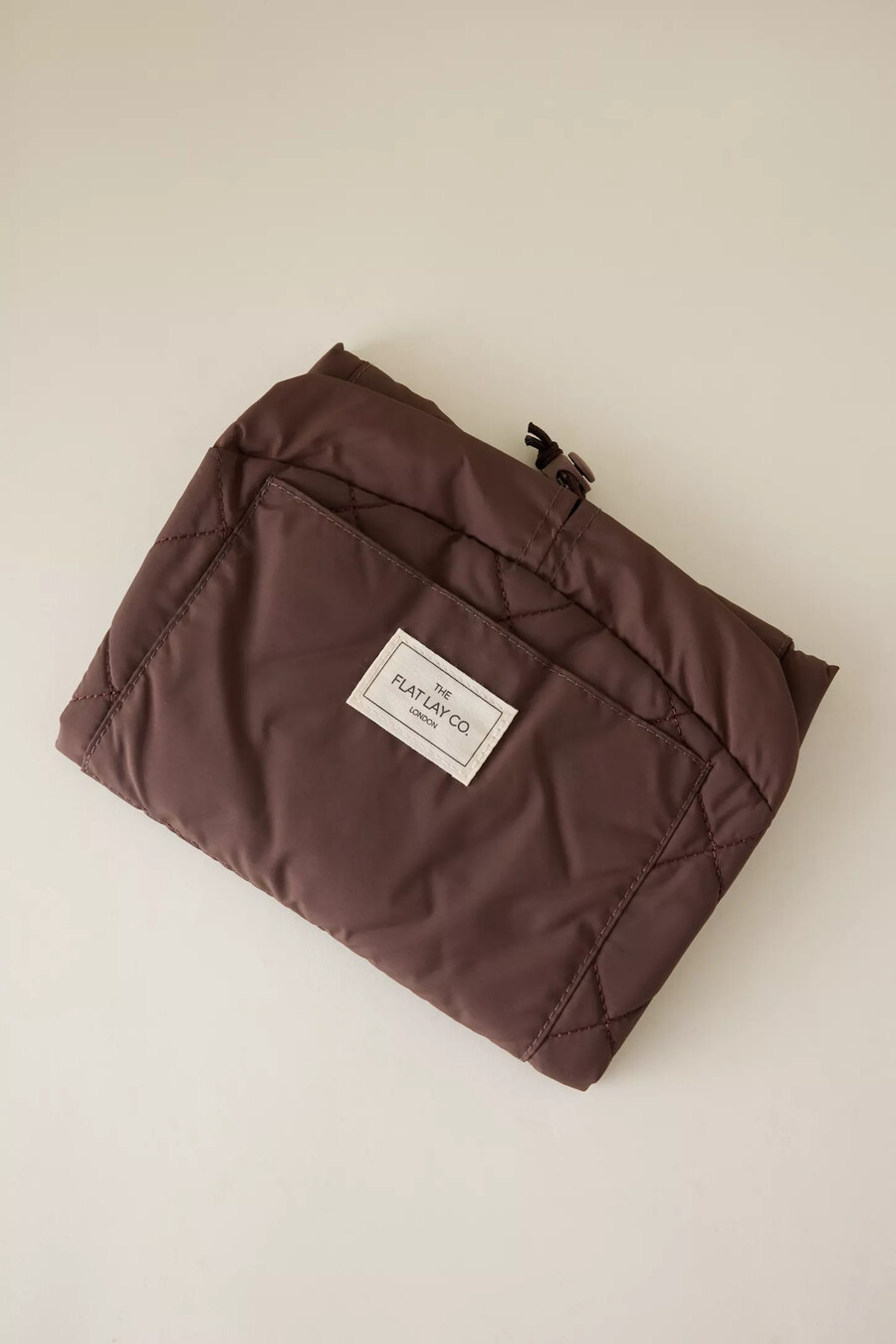 the flat lay co. open flat makeup bag