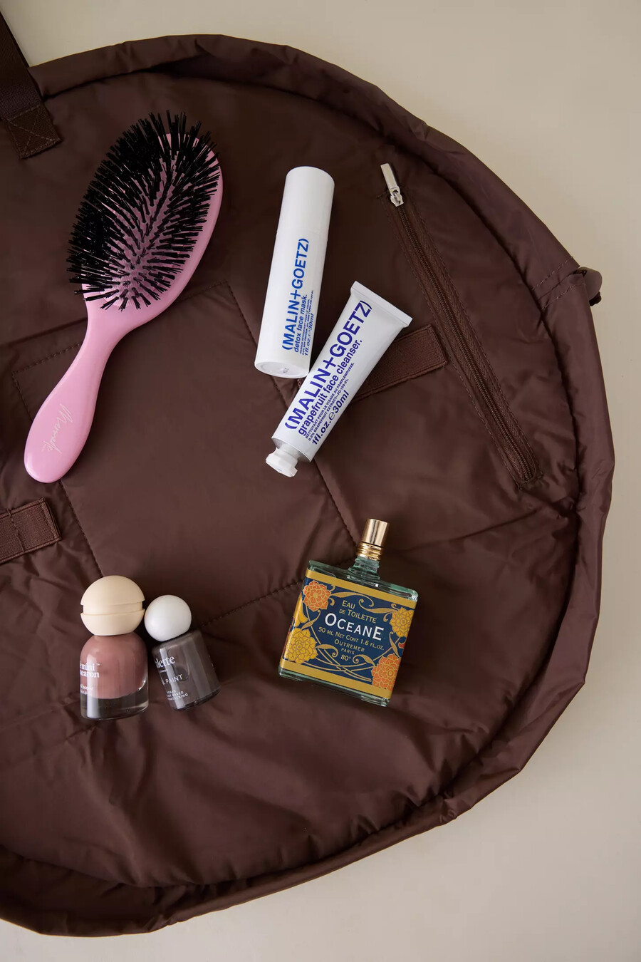 the flat lay co. open flat makeup bag