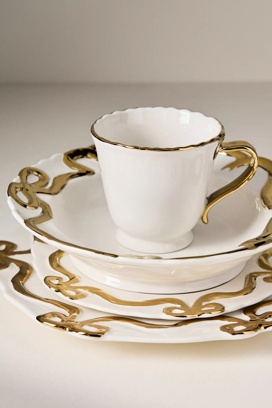benedita gold bow steingut-beilagenteller 4er-set