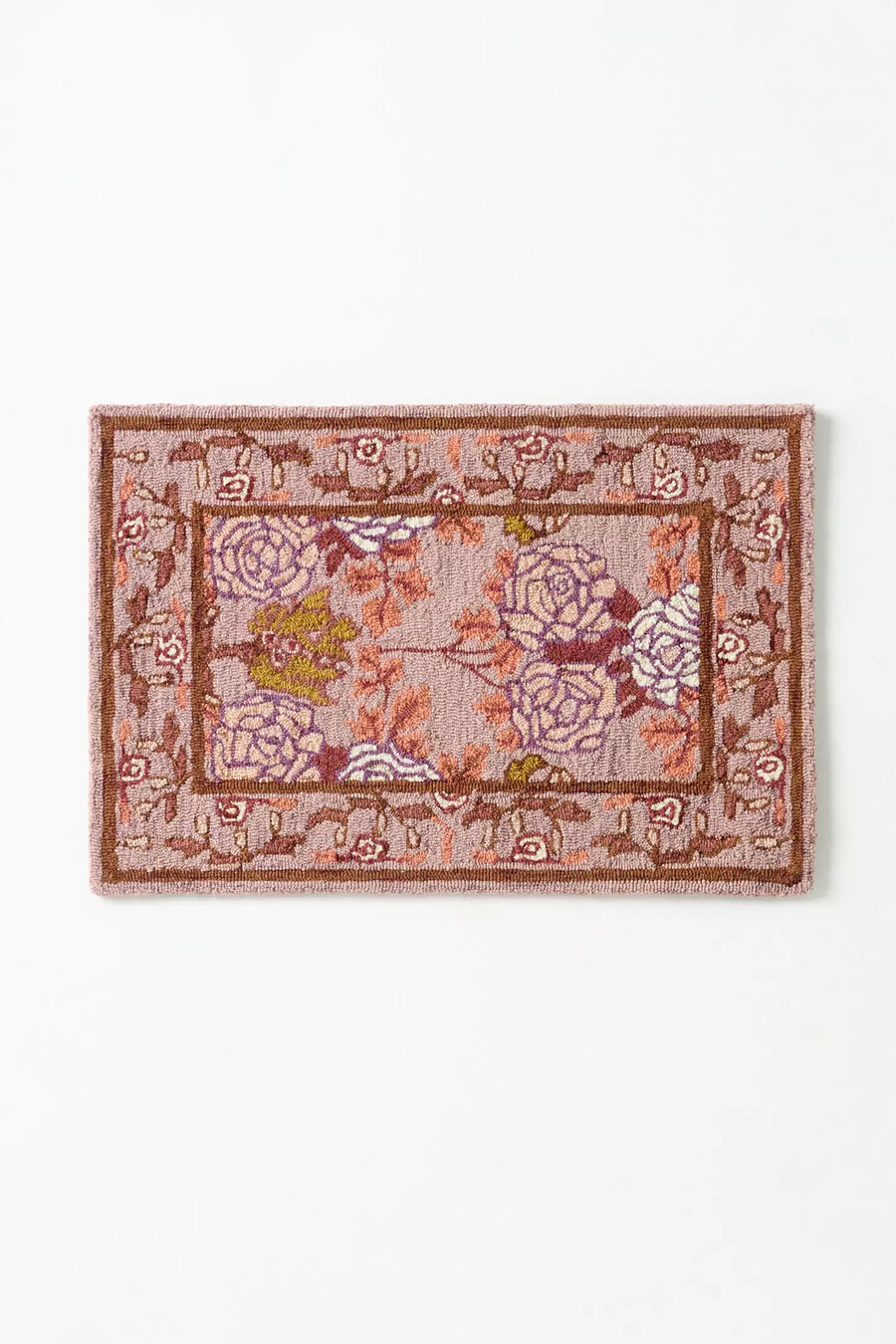 getufteter wollteppich mit gehäkeltem blumenrand