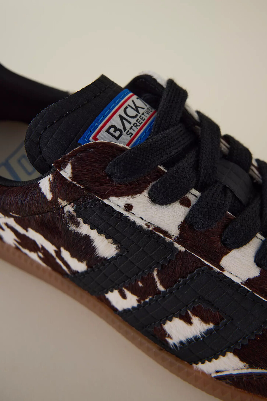 back 70 cow print cloud sneaker